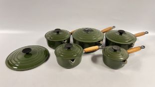 A SET OF 5 GRADUATED LE CREUSET CAST IRON ENAMELED SAUCEPANS AND LIDS NO.