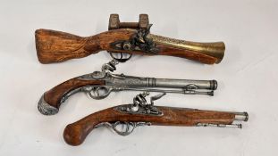 THREE ASSORTED REPLICA FLINT LOCK PISTOLS.