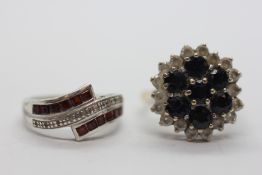 A 9CT GOLD CLUSTER RING ALONG WITH A SILVER DRESS RING.