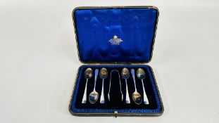 AN ANTIQUE SILVER TEASPOON AND SUGAR TONG SET IN A FITTED VELVET LINED BOX, SHEFFIELD, MAKER GGR.