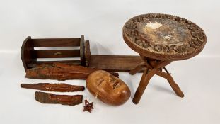 A SMALL CIRCULAR CARVED OCCASIONAL TABLE ON FOLDING LEGS + 3 GRADUATED CARVED LIVE EDGE TREE SPIRIT