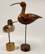 TWO HAND CARVED FOLK ART SHORE BIRDS ON WOODEN PLINTHS, H 45 & H 31CM.