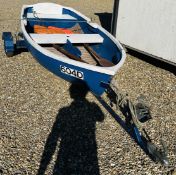 FIBRE GLASS 9.5 FT DINGHY AND TRAILER PLUS 2 OARS AND 2 LIFE JACKETS.