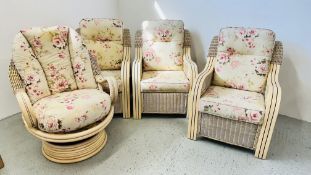A FIVE PIECE CANE CONSERVATORY SUITE COMPRISING 3 ARMCHAIRS AND A FURTHER SWIVEL EXAMPLE AND