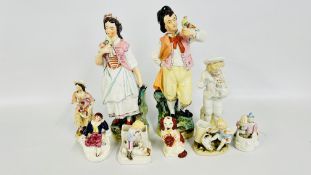 A GROUP OF STAFFORDSHIRE FIGURES AND MATCH STRIKERS, THE TALLEST 33CM (9 PIECES).