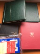 STAMPS: BOX WITH GUERNSEY AND JERSEY MINT COLLECTIONS TO 1990 IN LIGHTHOUSE HINGELESS ALBUMS,