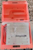 RUBI ND 180 ELECTRIC TILE CUTTER IN CARRY BOX - SOLD AS SEEN.