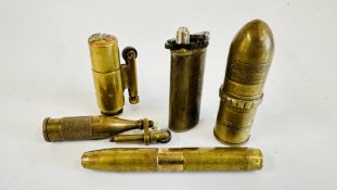 A GROUP OF 5 VINTAGE TRENCH ART LIGHTERS.