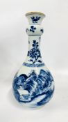 A CHINESE BLUE AND WHITE PORCELAIN BOTTLE VASE / GUGLET, PROBABLY QING, DECORATED WITH A LANDSCAPE,