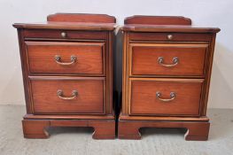 A PAIR OF CHERRYWOOD FINISH 2 DRAWER J.E COYLE BEDSIDE CHESTS.