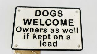 (R) DOGS WELCOME SIGN.