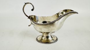 AN ANTIQUE SILVER SAUCE BOAT, BIRMINGHAM 1903, MAKER BARKER BROTHERS, H 13CM X L 17CM.