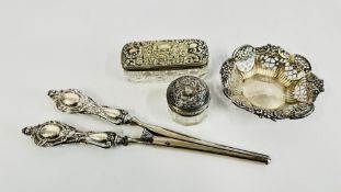 A SILVER CIRCULAR FACETED AND FRETTED BONBON DISH ALONG WITH A DRESSING TABLE GLASS PIN POT WITH