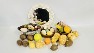 A GROUP OF POLISHED HARD STONE AND TREEN EGGS ALONG WITH A BUNCH OF GRAPES AND A CIRCULAR STUDIO