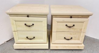 A PAIR OF BEECH FINISH TWO DRAWER BEDSIDE CHESTS WITH TOP SLIDES, W 50CM.