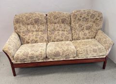 A TWO SEAT COTTAGE SOFA.