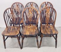 A SET OF SIX TRADITIONAL WHEEL BACK DESIGN KITCHEN CHAIRS.