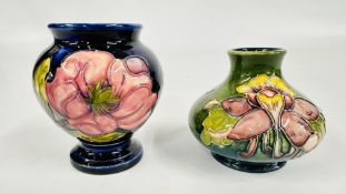 A MOORCROFT POTTERY VASE, MAGNOLIA PATTERN, STAMPED MOORCROFT + A FURTHER GLAZED SQUAT VASE,