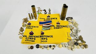 A BOX OF MIXED MILITARIA INCLUDING BADGES, MEDAL ETC.