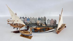 A GROUP OF MODEL SAILING AND ROWING BOATS AND MODEL STREET SCENE.