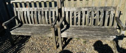 A PAIR OF HARDWOOD GARDEN BENCHES EACH 125CM.
