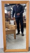 A GOOD QUALITY SOLID OAK FRAMED WALL MIRROR, W 60CM X D 120CM.