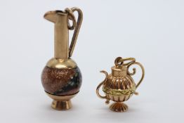 A 9CT GOLD AND ENAMEL EWER CHARM + A FURTHER YELLOW METAL EXAMPLE.