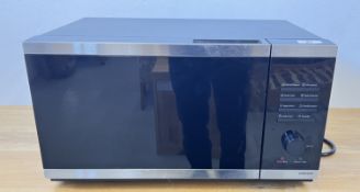 MODERN SAMSUNG MICROWAVE- SOLD AS SEEN.