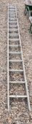 A SET OF SEVENTEEN TREAD ALUMINIUM DOUBLE EXTENSION LADDERS.