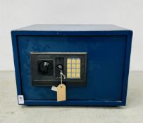 A HOME SECURITY SAFE (COMBINATION 7502 PLUS KEY).