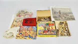 A GROUP OF VINTAGE JIGSAW PUZZLES TO INCLUDE WOODEN EXAMPLES (NOT GUARANTEED COMPLETE).