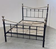 A REPRODUCTION TRADITIONAL VICTORIAN STYLE BRASS AND METAL DOUBLE BEDSTEAD.