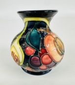 A MOORCROFT POTTERY VASE DECORATED IN THE 