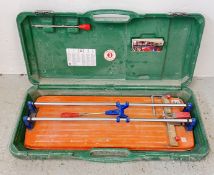 RUBI TS-60 PROFESSIONAL TILE CUTTER BOXED WITH ACCESSORIES.