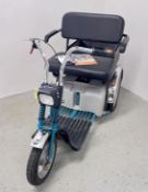 TGA SPORTSTER MOBILITY TRIKE WITH REAR CARRIER AND CHARGER - SOLD AS SEEN.