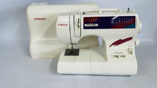 A SINGER SEWING MACHINE COMPLETE WITH FOOT PEDAL (NO CABLE) - SOLD AS SEEN.