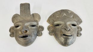 2 X POTTERY AZTEC STYLE WALL MASKS, THE LARGEST 26CM HIGH.