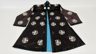 A CHINESE EMBROIDERED SILK JACKET.