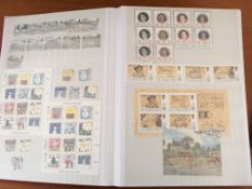 STAMPS: GUERNSEY MINT IN LARGE STOCKBOOK AND PACKETS EX NEW ISSUE SERVICE TO INCLUDE JERSEY AND