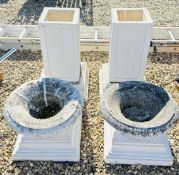 A PAIR OF PEDESTAL PLINTHS + TWO PLANTERS ON PEDESTALS.