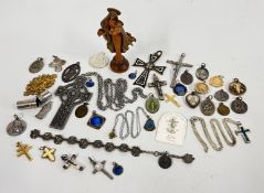AN ITALIAN CARVED MADONNA, VARIOUS CROSSES AND RELIGIOUS MEDALLIONS.