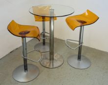 A CIRCULAR SINGLE PEDESTAL GLASS TOP BAR TABLE + A SET OF 3 