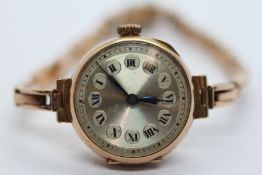 A VINTAGE LADY'S 9CT GOLD CASED WRIST WATCH,