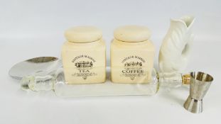 A BOX OF HOMEWARE INCLUDING A 'KESWICK SCHOOL' DISH AND A GLASS ROLLING PIN.