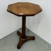 A C19TH MAHOGANY OCTAGONAL TABLE ON FACETED STEM AND SHAPED TRIANGULAR TRIPOD PLATFORM BASE, 17¾