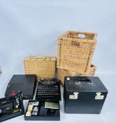 A SINGER SEWING MACHINE (NO FOOT PEDAL) AND A VINTAGE TYPEWRITER + 3 WICKER BASKETS.