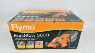 FLYMO EASI MOW 300R ELECTRIC LAWN MOWER BOXED UNUSED - SOLD AS SEEN.