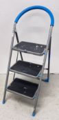 A SET OF MACALLISTER STEEL FRAMED FOLDING THREE TREAD HOUSEHOLD STEPS.