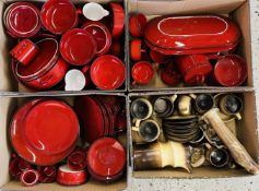AN EXTENSIVE GROUP OF GLAZED DEEP RED DINNER AND TEA WARE TO INCLUDE PLATES, BOWLS,