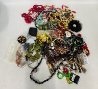 A GROUP OF ASSORTED COSTUME JEWELLERY TO INCLUDE BEADED NECKLACES, BANGLES,